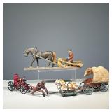 (3PC) HORSE & CARRIAGE TOYS | Cast iron horses carrying a firefighter and his trusty fire pumper; a 