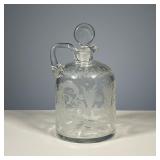 WHEEL ETCHED DECANTER | Blown glass decanter with a pontil, etched with duck and deer design. - h. 8