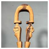 CARVED WOOD CANE | The handle with carved twin faces, with a snake/serpent below. - w. 4.5 x h. 39 i