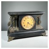 NGRAHAM SHELF CLOCK | Black painted wood frame with scrollwork metal mounts and faux painted marble 
