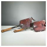 (2PC) ANTIQUE SHOVELS | Early, with leather covers.