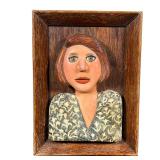 MEG SMEAL FRAMED BUST | Polychrome pottery bust of a woman, signed Meg Smeal; mounted into a wood fr