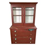 STEPBACK CUPBOARD IN OLD RED PAINT | 19th century Stepback Cupboard in old red paint over blue. Two 