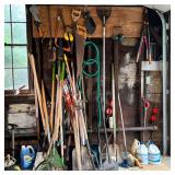 LARGE LOT OF YARD TOOLS | Lot of assorted yard tools (rakes, shovels, saws, hoes)