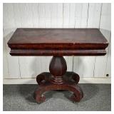 EMPIRE GAMES TABLE | 19th C Empire Games Table w/pedestal base. Some veneer loss. - l. 36 x w. 18 x 