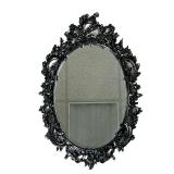 OVAL WALL MIRROR | Black oval wall mirror with wreath and floral border. - w. 19.25 x h. 29 in 