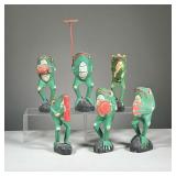 (6PC) CARVED POLYCHROME FROGS | Painted whimsically with instruments. - h. 8 in (each) 