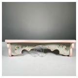 LIZ DORAN (20TH CENTURY) PAINTED WALL SHELF | Decorated with blossoming flowers, and vines, and a pi