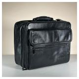 TRAVELWELL LEATHER COMPUTER CASE | Genuine leather computer case new with tag. Contains multiple poc