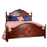 CARVED MAHOGANY KING BED | Fancy wood king bedframe with contrasting inlay and shell carvings; sold 