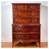 MAHOGANY TALL CHEST | Tall dresser with 6 drawers, shaped front and apron, with brass pulls. - l. 33