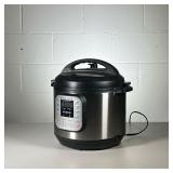 INSTANT POT PRESSURE COOKER | Includes 2 serving utensils, measuring cup, and steam tray. - h. 13 x 