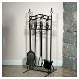 FIREPLACE TOOLS | Set of four fireplace tools and stand in a black finish. - l. 14 x w. 13 x h. 33 i