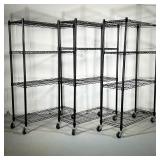 (3PC) BLACK ROLLING SHELVING UNITS | 3 black metal shelving units on casters, each containing 4 shel