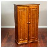 WOODEN MEDIA CABINET | Media storage cabinet having two doors with fitted shelves, with four shelves