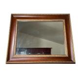 LARGE MIRROR | Large wall mirror with beveled glass, the frame in a dark brown finish with raised go