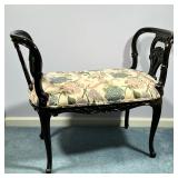 SMALL CUSHIONED BENCH | Dressing bench or vanity seat: carved wood with rounded sides, having floral