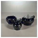 (3PC) SILVER OVERLAY TEA SET | Tea set in cark cobalt blue with silver overlay, comprising a teapot,