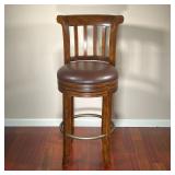 SWIVEL TOP BARSTOOL | Howard Miller barstool, dark wood with cushioned seat and wood back featuring 