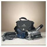 SONY DIGITAL HANDYCAM | Model No. DCR-TRV310. Includes camera, tape, extra battery, and power cable 