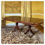 DUNCAN PHYFE DINING TABLE | Double pedestal dining table with brass capped feet, one leaf inserted, 