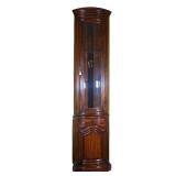 CORNER DISPLAY CABINET | Theodore Alexander dark wood display cabinet with domed front, having a tal