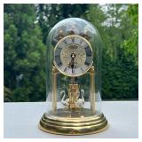 SWAROVSKI CLOCK | Domed quartz clock with four rotating crystal glass swans at the bottom, the clock