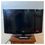 LG 32” TV | Flatscreen TV, model no. 32LH20-UA. - w. 31.5 in 