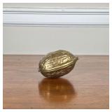 BRASS WALNUT NUT CRACKER | Brass nutcracker in the shape of a walnut. - l. 5 x w. 4 x h. 3 in 