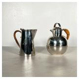 (2PC) PAIR SILVER PLATED RATTAN PITCHERS | Includes pair of silver plate pitchers with rattan handle