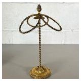 DECORATIVE GOLD PAINTED PIECE | Decorative curved metal statue, painted gold, with decorative wreath