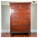 TALL WOOD DRESSER | Dark wood dresser with double drawers over four graduated full-width drawers. - 