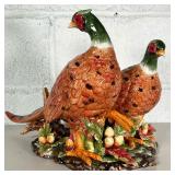 LARGE CERAMIC PHEASANT STATUE | Pair of ceramic pheasants stepping through flora and fauna. - l. 18 