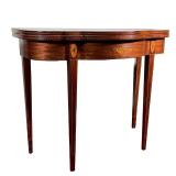 Hepplewhite Games Table | 19th-century veneer games table with barber pole, urn form and fan inlay i