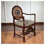 Medallion Back Armchair | Vintage unusual carved circle-back with cane insert. Scroll carving throug