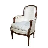 Louis XV Style Bergere | French style mahogany armchair with rounded back and armrests and cream uph