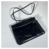 Salvatore Ferragamo Handbag | Black leather Salvatore Ferragamo night purse with a thin black strap 