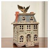Victorian Eagle Still Bank | A cast iron still bank in the shape of a three-story bank building, wit