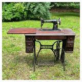 Singer Stenciled Sewing Machine | Vintage Singer foot-pedal powered sewing machine with cast frame i