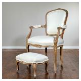 (2pc) Bergere Chair & Ottoman | A French Louis XV-style bergere arm chair with white upholstery and 