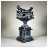 Composition Jardiniere | Italianate composition urn / jardiniere with putti. - l. 11 x w. 9 x h. 19 