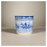 Ralph Lauren Cup | A small blue and white cup by Ralph Lauren featuring men on horseback and dogs pr
