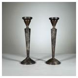Pair Sterling Candlesticks | A pair of sterling cement-filled candlestick, numbered "810" on the bot