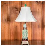 CARVED JADE LAMP | Brass vase with carved wood ring supports large beautifully carved jade with flow