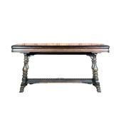 TUDOR-DUPLEX TABLE | Carved dark wood table with center drawer. Intricately carved H-stretcher on bo