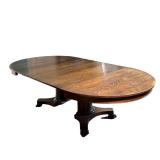 Oak Round Table | Oak round dining room table with 6 leaves. - l. 54 x w. 54 x h. 30.5 in (Table wit