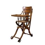 Oak High Chair | Child’s oak high chair with carved back. - l. 18 x w. 21 x h. 38.5 in All Country E