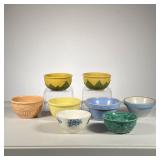 (8pc) Shawnee Pottery Bowls | Lot includes: (2) Shawnee Corn bowls. (5) Coloured Bowls. (1) Blue Flo
