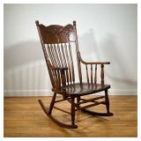 Oak Rocker | Oak Rocker with Pressed back design. - l. 25.5 x w. 31 x h. 42 in (Width is rocker to r