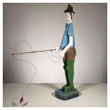 Folk Art Fly Fisherman | Hand carved and painted fly fisherman casting line with fly at the end. - l